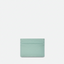 Vue arrière d’un porte-cartes de crédit en cuir menthe, mettant en valeur la texture du cuir.