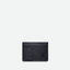 Porte-cartes en cuir grainé noir. Avec sur sa face avant le X iconique de la maison Faubret et une languette en cuir embossé Faubret.