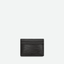 Porte Cartes en cuir noir. Un cuir grainé pour les parties supérieur et strier sur la partie inferieur.